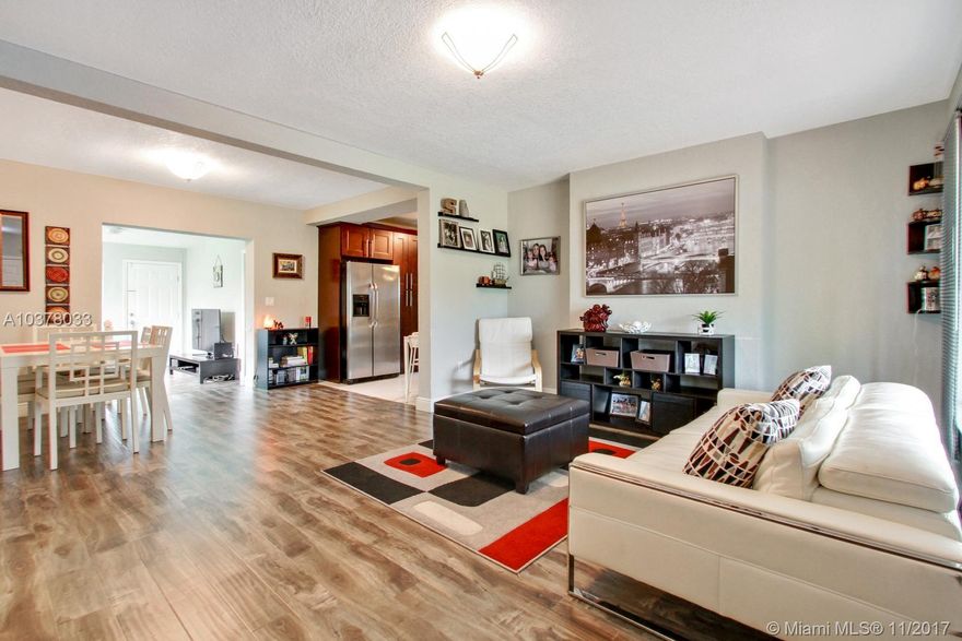 THIS CHARMING CONTEMPORARY 3BED/2BATH HOME SITS IN A QUIET CUL- DE- SAC IN MIAMI SHORES. GORGEOUSLY RENOVATED IN 2015. THIS READY TO MOVE-IN HOME OFFERS GREY STAINED ENGINEERED WOOD FLOORS THROUGHOUT. A SPLIT FLOOR PLAN WITH A SEPARATE FAMILY ROOM AND LOTS OF BRIGHT LIGHT. LOTS OF "NEW':  NEW ROOF, NEW ELECTRIC, NEW A/C, NEW PLUMBING, NEW HURRICANE IMPACT GLASS, NEW KITCHEN AND NEW BATHROOMS.  ENJOY THE HUGE FENCED YARD WITH  ROOM FOR A POOL. ATTACHED IS A ONE CAR GARAGE. BRING YOUR CLIENTS AND WATCH THEM FALL IN LOVE.