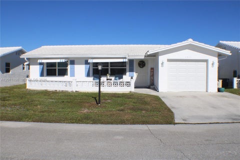 Photo of 1511 Alfred Dr, Boynton Beach, FL 33426 (MLS # A12011898)