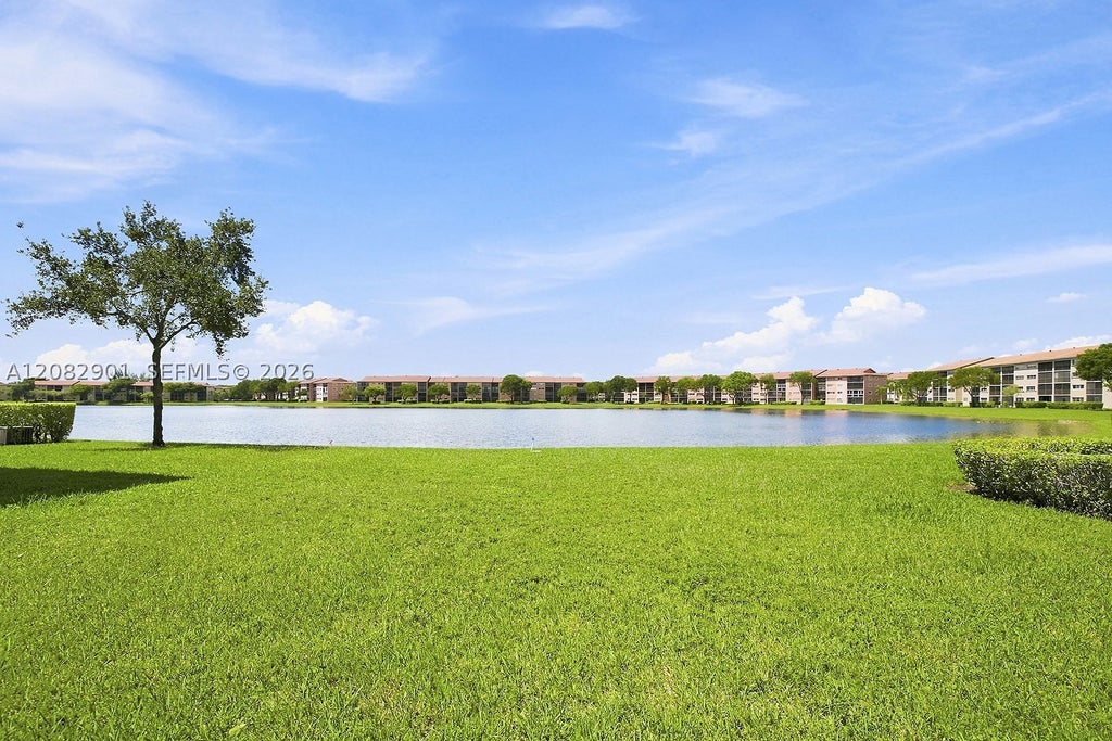Photo of 550 SW 138th Ave #402K, Pembroke Pines, FL 33027 (MLS # A12082901)