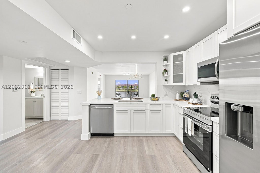 Photo of 550 SW 138th Ave #402K, Pembroke Pines, FL 33027 (MLS # A12082901)