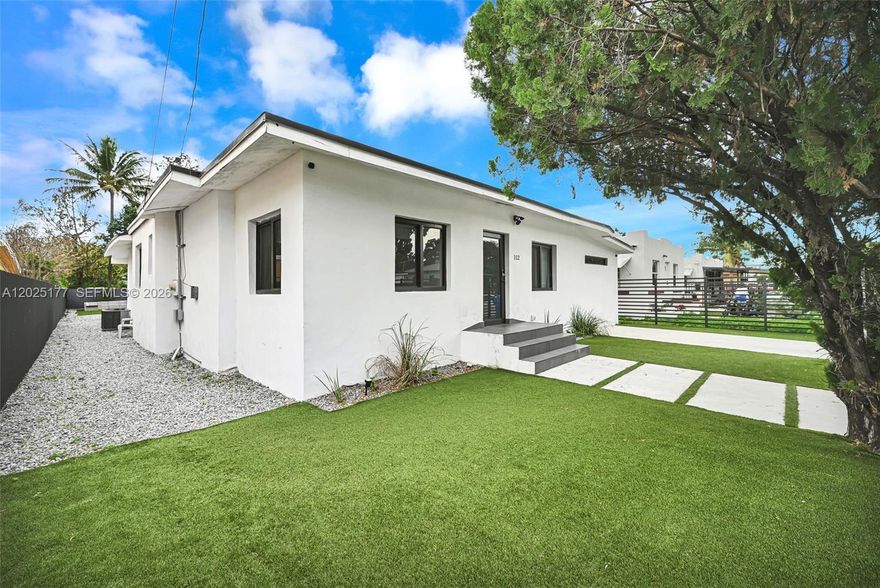 Stunning fully gut-renovated 4BR/3BA home with permits throughout. This property has been completely transformed with all major systems replaced, including a new roof, impact windows, updated electrical and plumbing, and a fully permitted pool—delivering the look, feel, and functionality of a brand-new home. The spacious open-concept layout showcases elegant tile flooring, beautifully designed modern bathrooms, and top-of-the-line Samsung stainless steel appliances. Every detail has been thoughtfully upgraded to combine style, comfort, and quality. Step outside to your own private, resort-style retreat featuring lush landscaping and a beautiful wood deck/balcony—perfect for entertaining or relaxing in total privacy. Unique zoning allows for Bed & Breakfast use, creating an exceptional opportunity for both investors and end users. Previously operated as a successful short-term rental, generating approximately $130K–$160K in gross annual income. Move-in ready and income-producing—this is a rare opportunity you don’t want to miss.