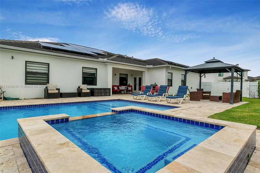 This elegant 2019 pool home exemplifies luxury living in South Florida. Situated on a 14,000+ sq. ft. corner lot in the desirable Vilhen Drive Estates neighborhood of Miami, this residence offers a well-designed floor plan. Featuring 4 bedrooms, a large den/office, 3.5 bathrooms, with 2 bedrooms having en suite bathrooms, all bedrooms with walk-in closets plus a 2-car garage with fully built-in storage. Stunning 10’ ceilings, a modern island kitchen with wood cabinetry, granite countertops, SS appliances & an extended double pantry. High-impact windows & doors & new solar panels. Outdoor is resort-style with a saltwater heated pool & spa, travertine decking & beautifully landscaped with easy access for boats or RVs. Located near major highways, shopping & dining. No association fees.