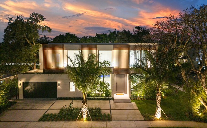 Newly completed tropical modern estate built by the Balli Group embodies luxury and sophistication. Designed by Balli-Trautman Architects, this 5,775+/- sf home is set on a beautiful lot in the Ponce/Davis area. A thoughtfully designed floorplan features 6 bedrooms and 6 bathrooms, including a private and luxurious primary suite and separate guest suite. Exotic materials, designer finishes and smart home technology ensure a home designed with the highest standards of quality and craftsmanship. The home’s expansive entertainment areas are perfect for hosting. The gourmet kitchen and living areas flow effortlessly outdoors where a lush tropical oasis awaits.  This residence is a true testament of luxury, designed for those who seek style, modern comforts and the perfect centralized location.