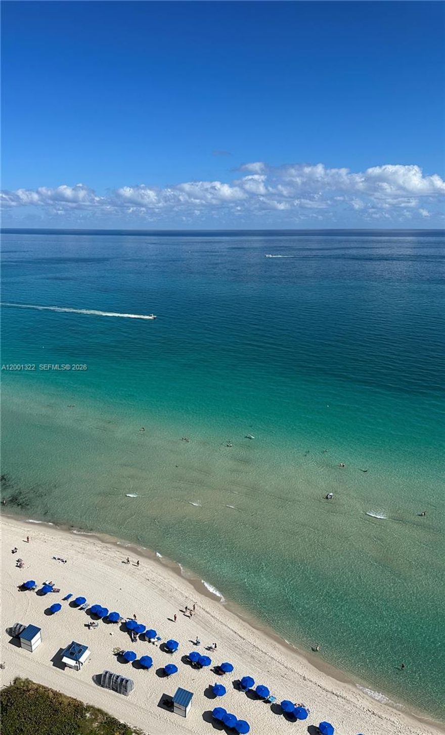 Refined oceanfront living at the iconic Akoya Miami Beach, offering unobstructed, panoramic Atlantic views from every principal room. This fully furnished residence delivers a rare blend of privacy, light, and understated elegance, with floor-to-ceiling glass framing endless ocean vistas and a spacious private terrace designed for seamless indoor-outdoor living. Thoughtfully laid out with a split-bedroom floor plan, the home features a bright, open living and dining area, curated furnishings, and a clean, modern aesthetic. The kitchen is efficiently designed with quality appliances and generous storage, while both bedrooms offer comfort, proportion, and natural light. Akoya is one of Miami Beach’s most established full-service buildings, providing direct beach access and a complete suite of resort-style amenities including an oceanfront pool, fitness center, tennis courts, sauna, valet, and 24-hour security. Ideally positioned along a quieter stretch of Miami Beach, yet within easy reach of Bal Harbour, Sunset Harbour, and South Beach dining and retail. A turnkey residence suited for those seeking a polished, effortless lifestyle in one of Miami’s premier oceanfront addresses.