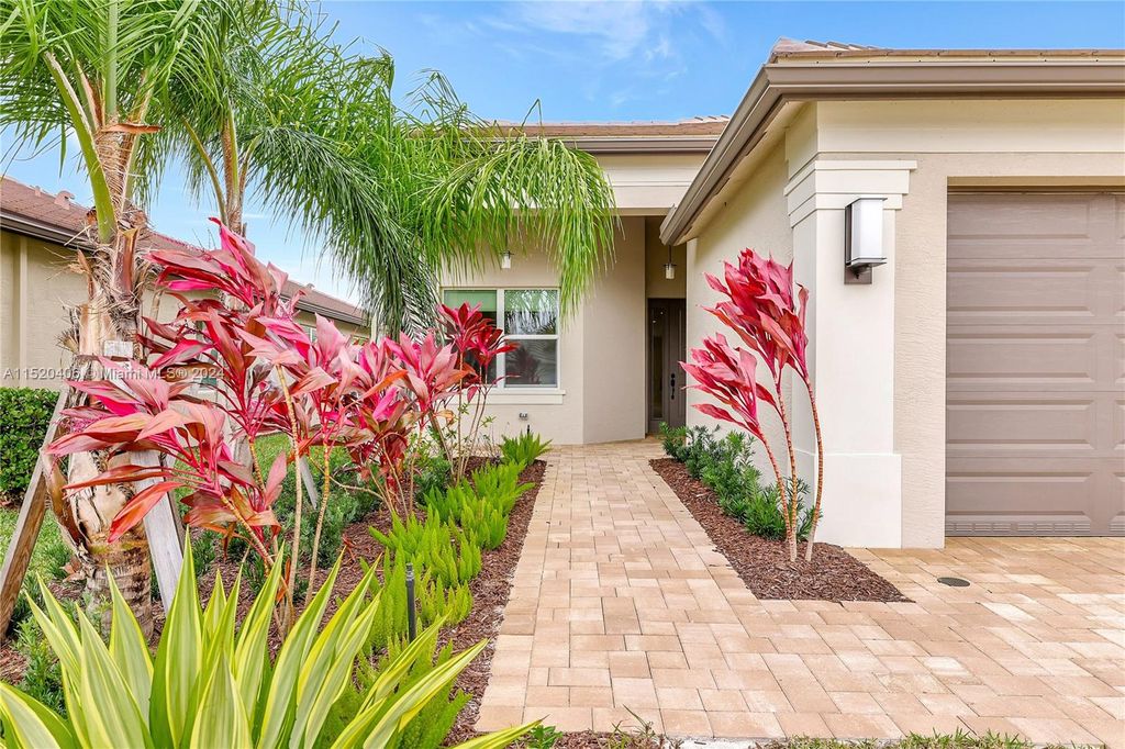 Photo of 13435 SW River Rock Rd, Port Saint Lucie, FL 34987 (MLS # A11520406)