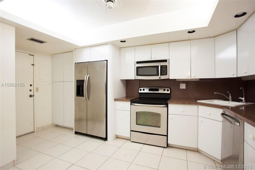 Location, location, location. PRICE REDUCTION! Largest 2 bedroom, 2 bath apartment faces beautiful Biscayne Bay and the Miami Beach skyline.  Drink morning coffee, or afternoon tea (or wine) on your balcony, enjoying million dollar views and warm, tropical breezes.  Restaurants, banks, shopping, beauty salons, medical facilities and more are within walking distance. The property has a beautiful pool area with a men's and women's sauna and shower, a gym, library, card room and billiard room. All assessments have been paid on this unit.  Unit comes will additional storage room on the 4th floor. All residents receive informative monthly newsletters. Call listing agent... easy to show.  Dial 126 to enter upper ramp visitor parking and also to enter the building. Association approval required.