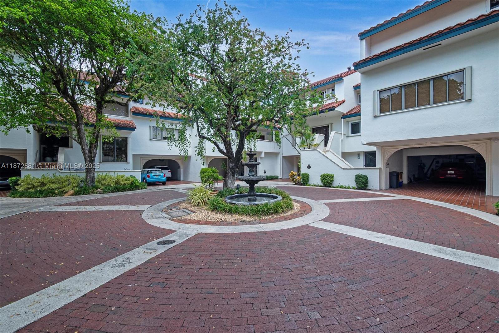 Your opportunity to make this tranquil corner villa at L'Hermitage community yours! Whether you love entertaining or just relaxing in a spacious space, this unit has all you need! Minutes to Brickell, Cocowalk, or Coral Gables and plenty of parks and A rated schools! Enjoy the community pool with bbq area, steam room and hot tub, putting green, tennis courts and marina. Inside you find unique Spanish tile floors coupled with beautiful woodwork throughout makes for a warm and welcoming setting. Massive Master Bedroom with study and stunning stone walls in bathroom accompanied with towering ceiling heights. Two additional bedrooms makes this 3bed 3 1/2 bath villa complete. Schedule your tour today!