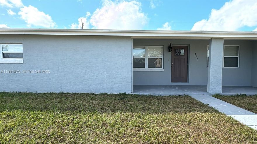 Discover this beautiful updated residence 3/2 in Port Charlotte. Featuring a contemporary kitchen equipped with sleek shaker cabinets,  granite countertops, and stainless steel appliances. The open-concept design seamlessly integrates the kitchen with the living areas, with nice tile flooring that combines style with easy maintenance.
The spacious master suite serves as a serene retreat, boasting a generous walk-in shower and ample closet space. The attention to detail and high-quality finishes in the master bathroom provide a spa-like experience right at home. Additionally, you can rest easy knowing that the air conditioning and water heater are just four years old, ensuring comfort and efficiency.
This home is ideally situated near Port Charlotte Beach Park, the picturesque Peace River, and convenient access to US 41. Enjoy proximity to excellent schools, a variety of local attractions, and close to dining options. Don’t miss the opportunity to make this gorgeous home yours and experience the best that Port Charlotte has to offer.
