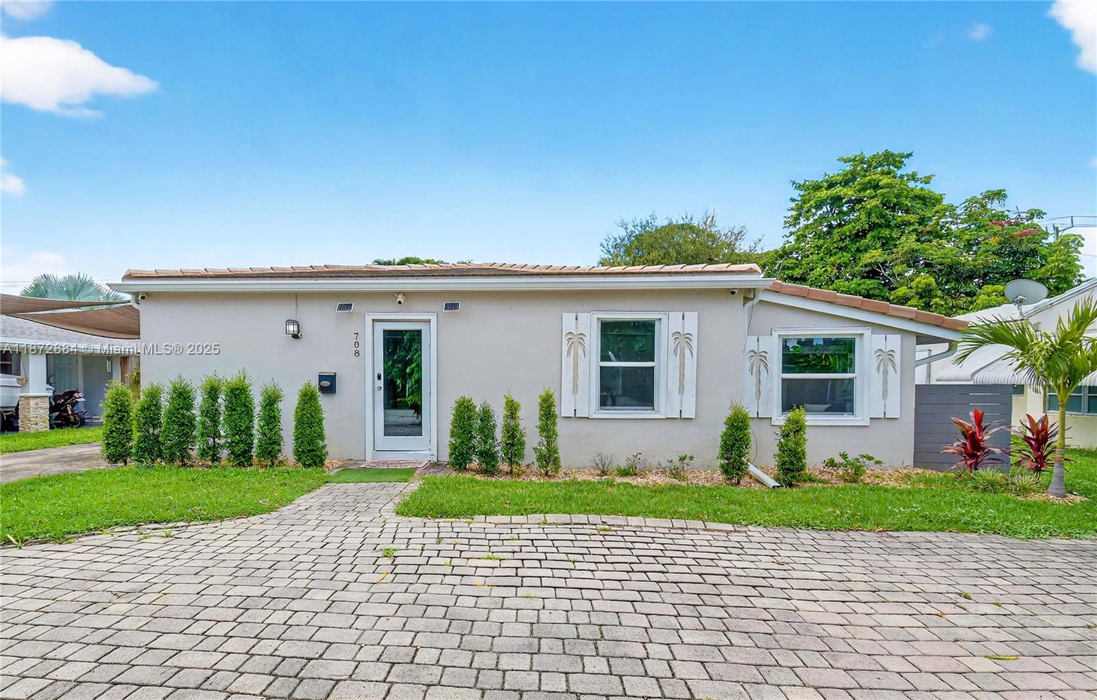 Step into luxury living in this beautifully upgraded 3Br/2Ba residence in prestigious Croissant Park- No HOA! Designed for both style and comfort, this home boasts a resort-inspired backyard with a state-of-the art heated saltwater pool, sleek pergola, fully equipped summer kitchen with gas BBQ, ice maker, dining island, and fire pit—perfect for entertaining. Inside, Impact windows/doors, solar panels, a new roof (2023), updated kitchen & baths, and refined finishes throughout. With its prime East Fort Lauderdale location—just minutes to the beach, Downtown/ Las Olas Blvd, world-class dining, shopping, top-rated schools, airport and cruise port- this home offers the perfect blend of sophistication, convenience, and coastal lifestyle. Schedule your showing today!