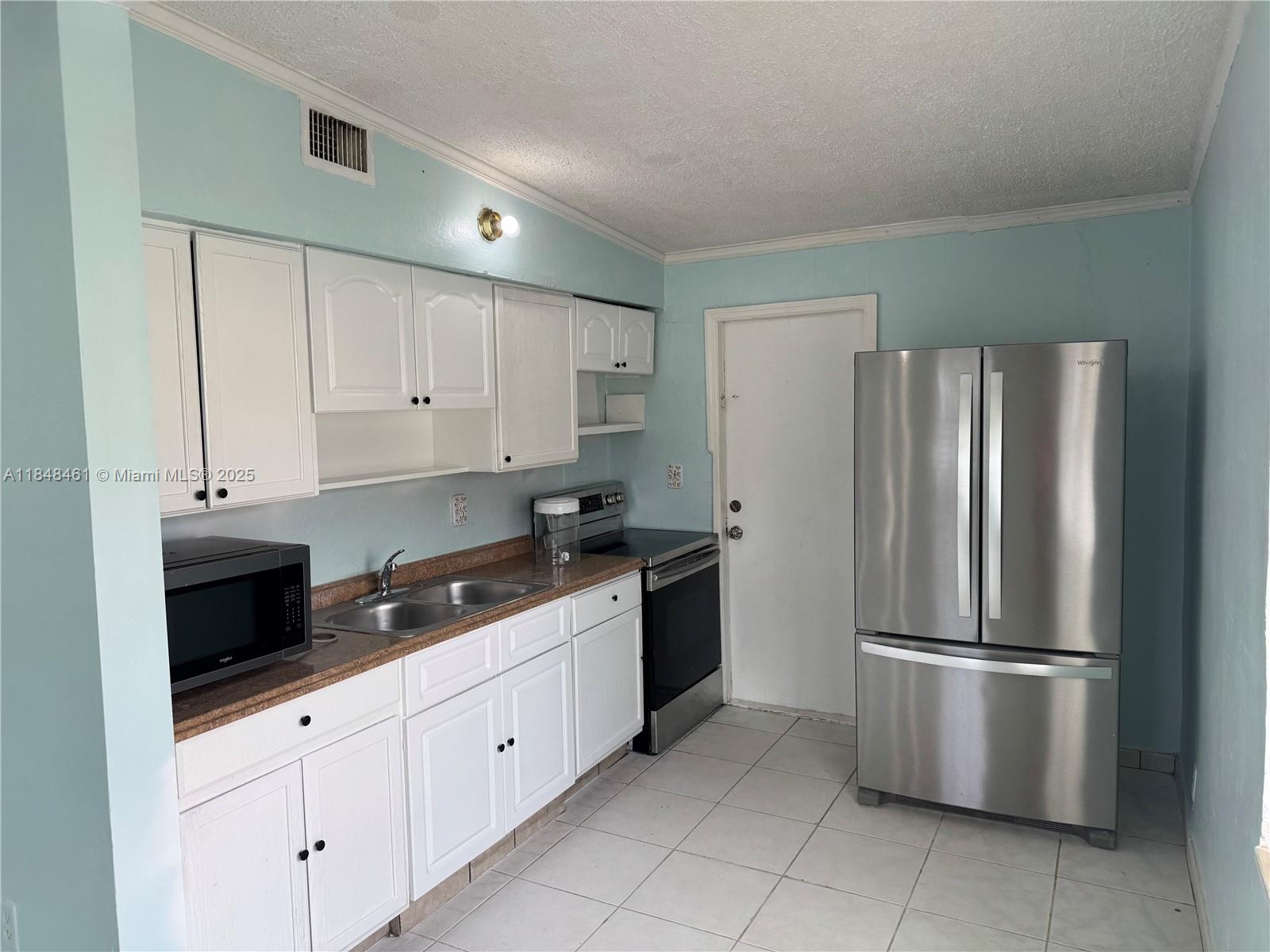 Charming 2-bedroom, 1-bathroom home for rent in Opa-locka with impact windows, a new roof, and spacious layout and comfortable living areas. This property sits on a large lot, perfect for entertaining, parking multiple cars, or storing an RV or boat. Enjoy the convenience of nearby highways, schools, and local amenities. A great rental opportunity with plenty of outdoor space and flexibility to fit your lifestyle.