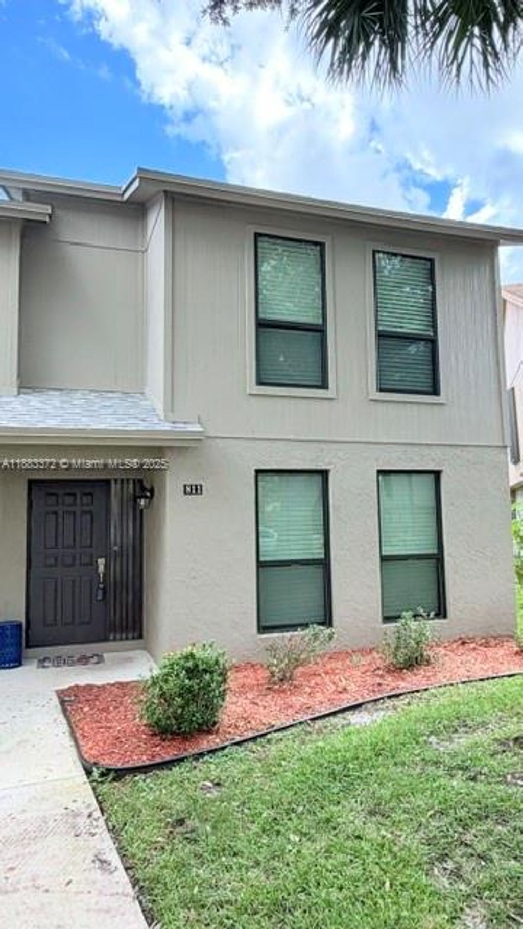 Photo of 811 Sandtree Dr #811, Palm Beach Gardens, FL 33403 (MLS # A11883372)