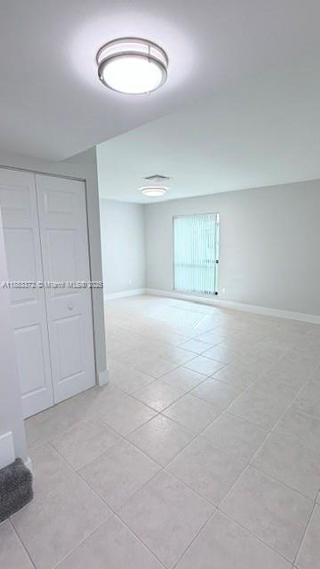 Photo of 811 Sandtree Dr #811, Palm Beach Gardens, FL 33403 (MLS # A11883372)