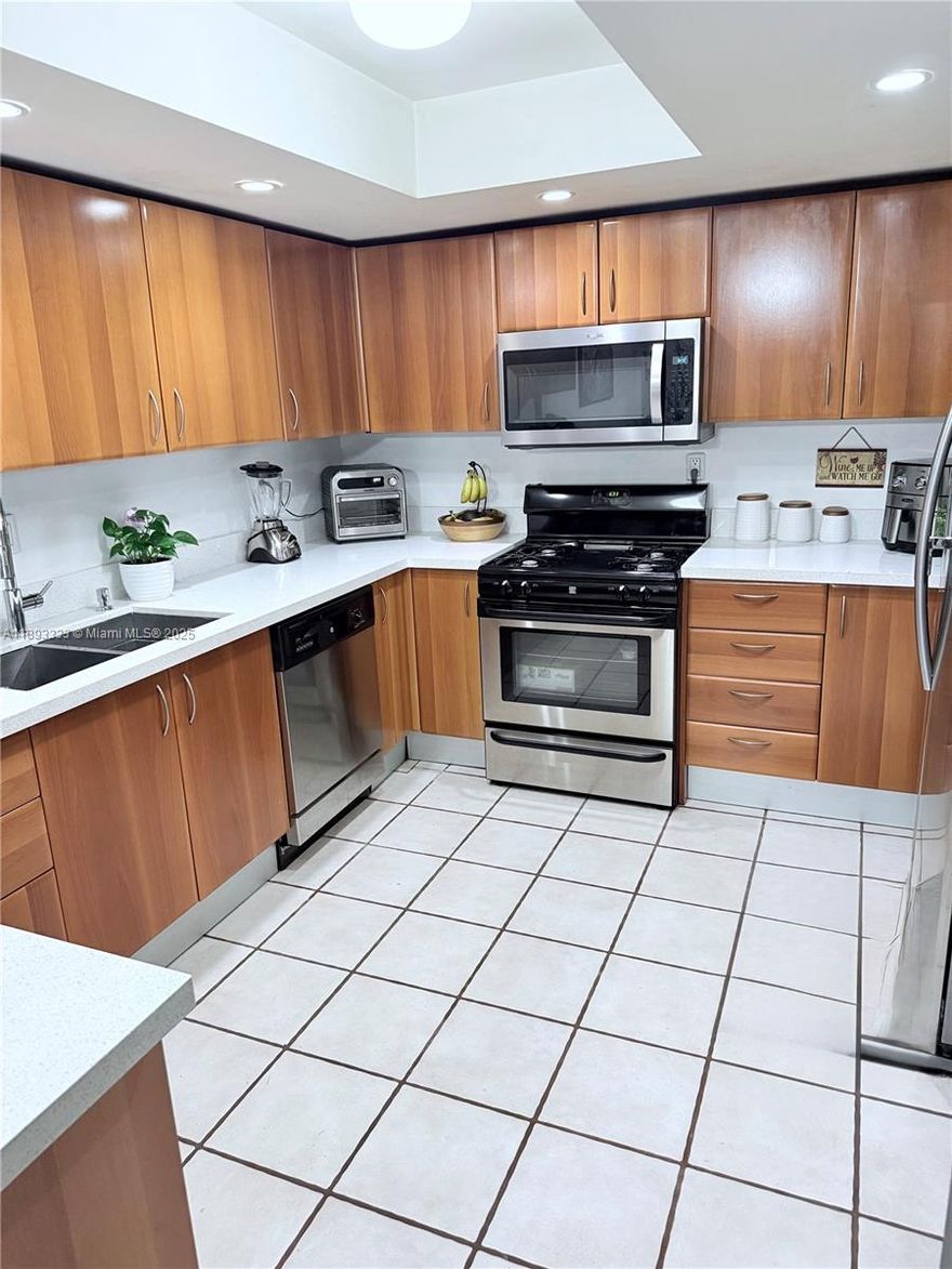 Elegant 2BD/2.5BA townhome in serene Snapper Village. Remodeled kitchen w/SS appliances & Corian Countertops and modern finishes. Spacious living areas open to a private garden patio—perfect for relaxing or entertaining. Bathrooms have been remodeled, Ceramic tile downstairs, Wood floors upstairs. Second floor has huge bedrooms with vaulted ceiling and balconies. This community boasts Resort-style amenities: Olymic size pool, tennis courts, Club pavilion & more. HOA includes Basic cable, water, insurance, roof, lawn, trash, & 24-hr guard.