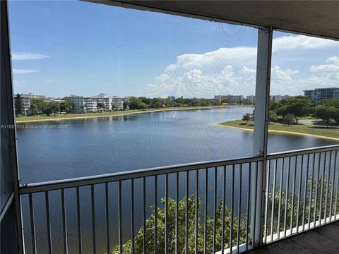 Photo of 2900 N Course Dr #609, Pompano Beach, FL 33069 (MLS # A11857520)