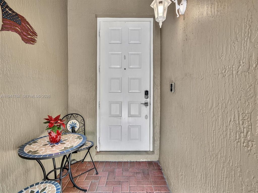 Photo of 12573 NW 56th Dr, Coral Springs, FL 33076 (MLS # A11941784)