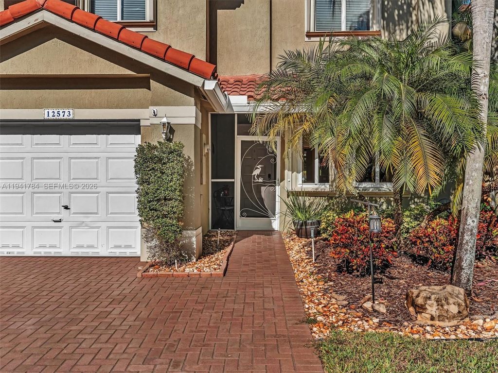Photo of 12573 NW 56th Dr, Coral Springs, FL 33076 (MLS # A11941784)