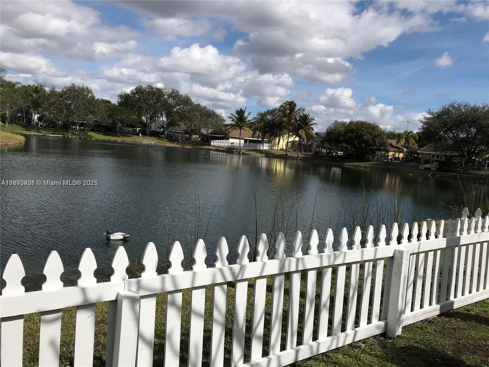 Available on Nov.1, 2025. Gorgeous lakefront 3bd /2 ba + 1 car garage in the desirable Cooper City! Great A Schools in the walking distance! Great Friendly Neighbors. Split bedroom floor plan. Vaulted ceiling. Open kitchen, granite countertop, antique-style wood cabinets, formal dining. Whirlpool bathtub. Accordion hurricane shutters. Living area and master bedroom are facing the lake. Enjoy sunshine, breezes and lake view in the orchid patio. Non-refundable pet fee $300.