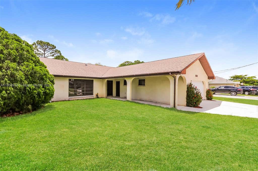 Photo of 1434 SW Broadview St, Port Saint Lucie, FL 34983 (MLS # A11608959)