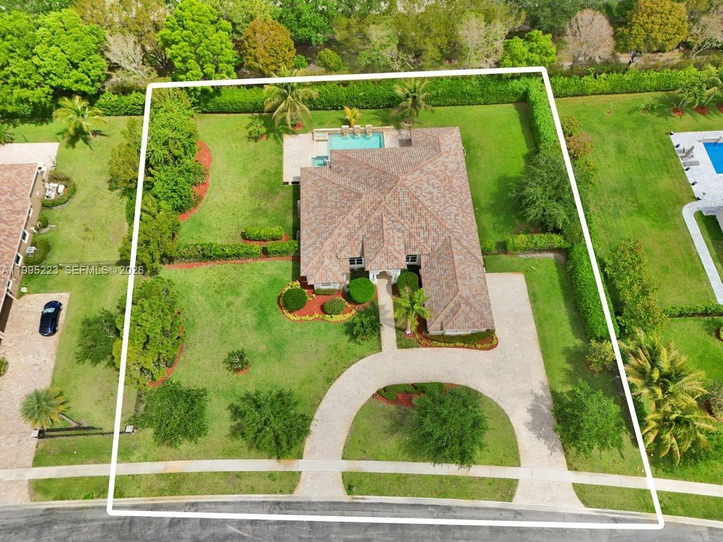 Photo of 14401 N Jockey Cir N, Davie, FL 33330 (MLS # A11995223)
