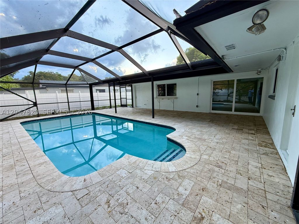 Photo of 9110 NW 18th Ct, Pembroke Pines, FL 33024 (MLS # A12047620)