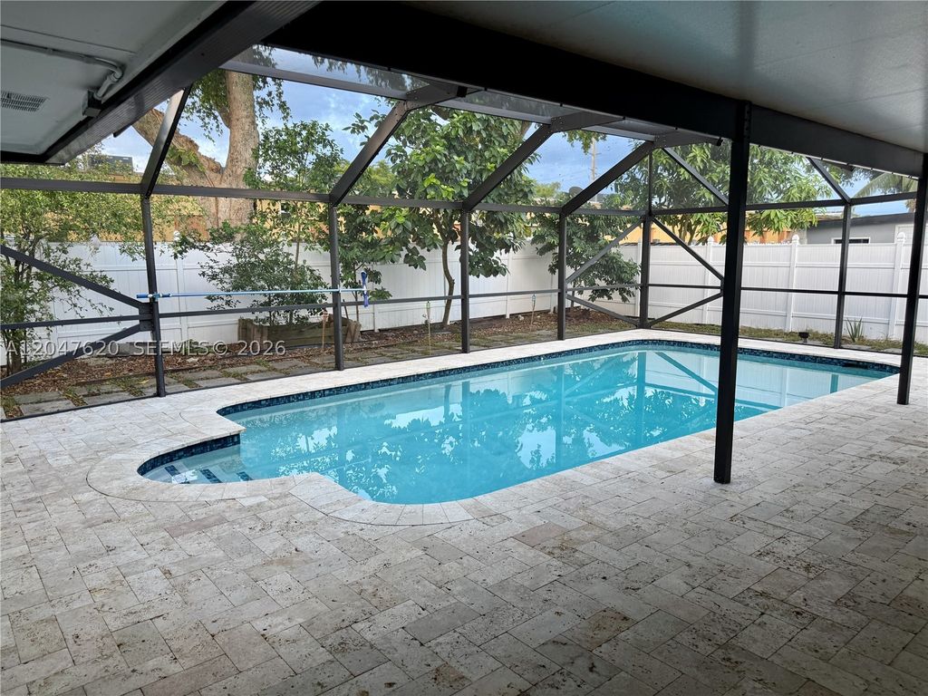 Photo of 9110 NW 18th Ct, Pembroke Pines, FL 33024 (MLS # A12047620)
