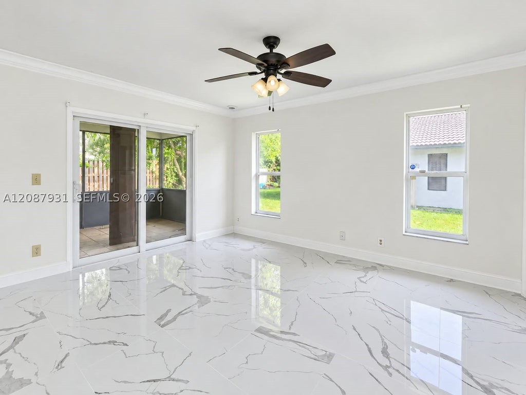 Photo of 2375 NW 123rd Ave, Coral Springs, FL 33065 (MLS # A12087931)