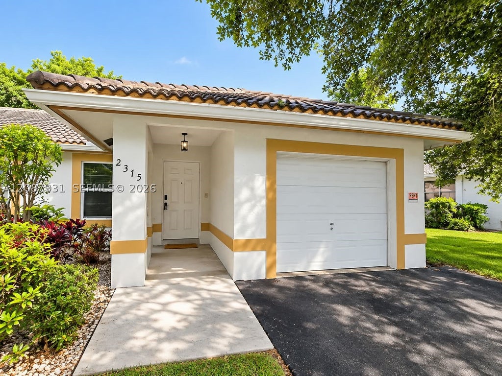 Photo of 2375 NW 123rd Ave, Coral Springs, FL 33065 (MLS # A12087931)