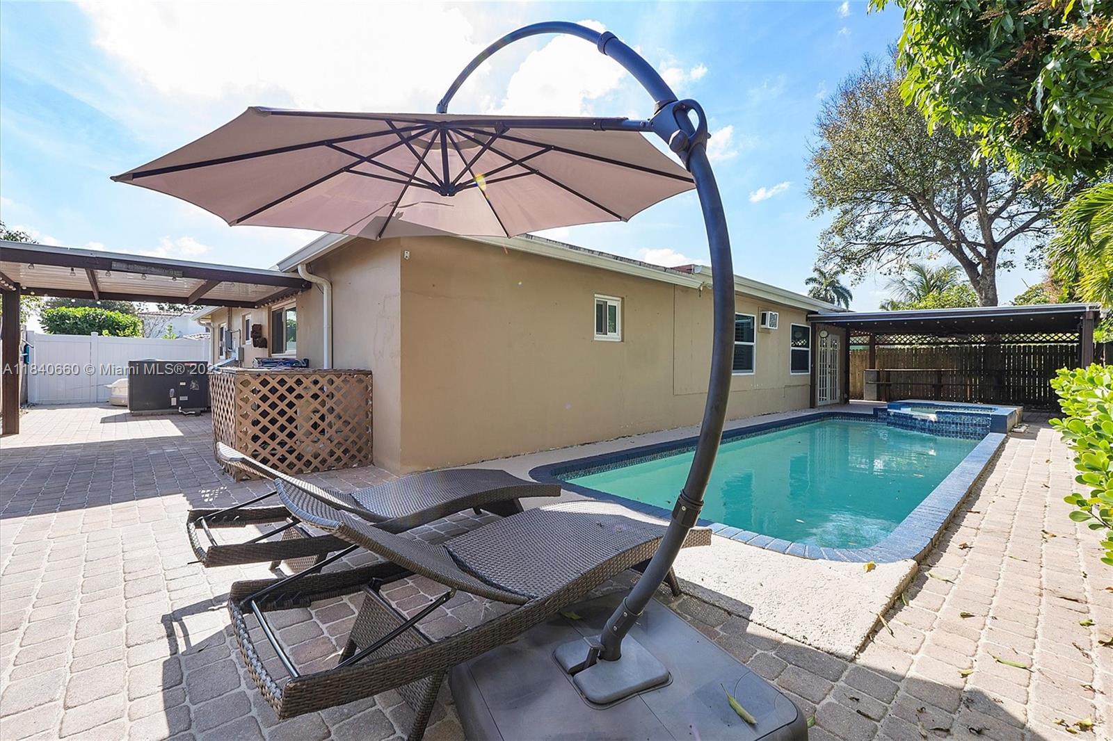Modern comfort with timeless design. Beautifully renovated home features brand-new French oak wood flooring, the open layout includes a fully updated kitchen with quartz countertops and island and new appliances. Smart home features include Wi-Fi–enabled ceiling fans, a new thermostat, Ring cameras, and an alarm system. Both bathrooms are tastefully remodeled, and key upgrades include a 2017 roof, new A/C, and a tankless water heater. Outdoors, enjoy a sparkling pool, spa, shower, and 2 spacious patio areas with pergolas—all within a fenced backyard. Additional highlights include recessed lighting. Low annual HOA fee. Conveniently located. Bundled service pricing available for buyers. Connect with the listing agent for details. Ask about the assumable VA loan with 3.5% interest rate.