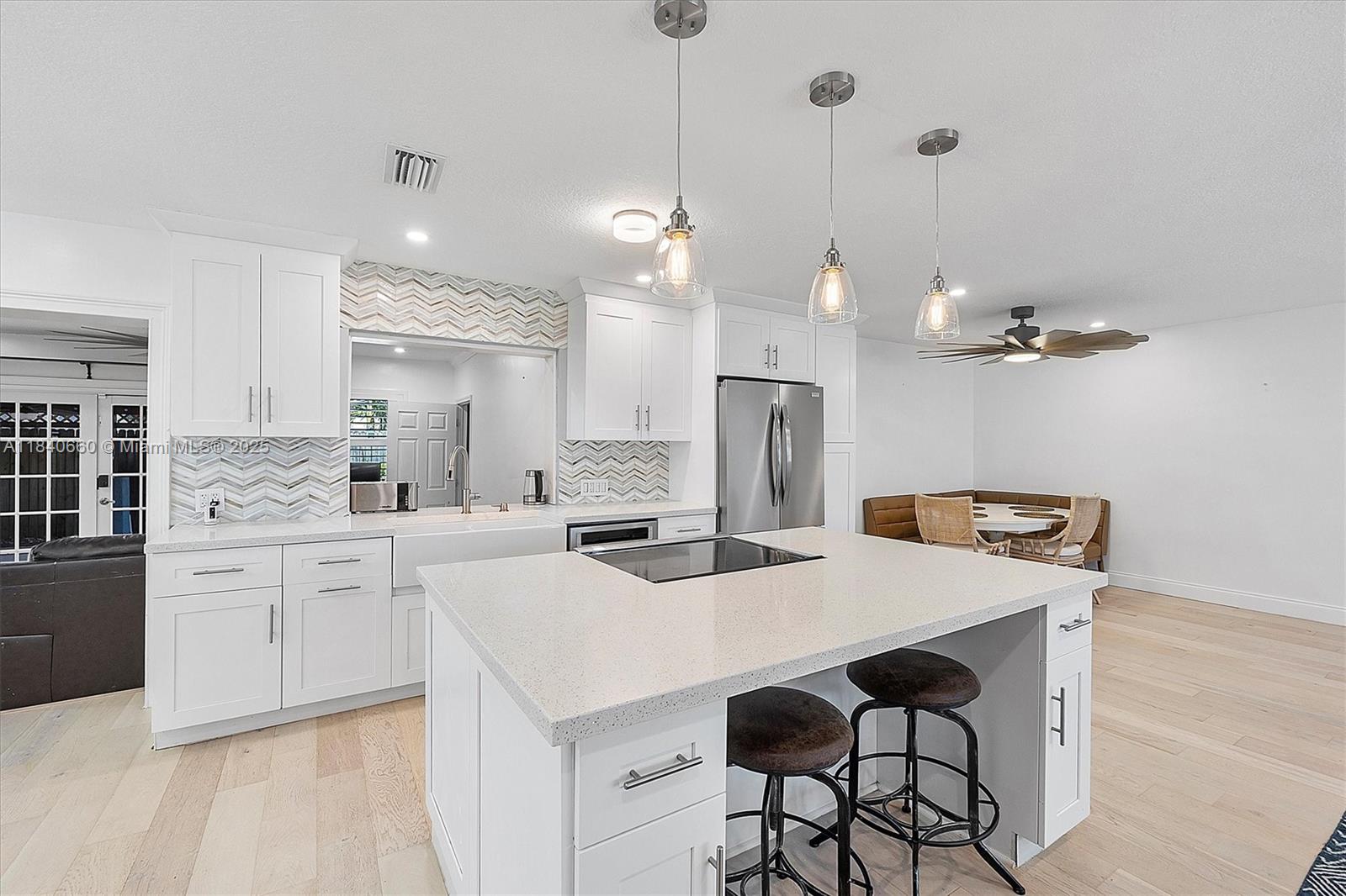 Modern comfort pool home with timeless design. Beautifully renovated home features brand-new French oak wood flooring, the open layout includes a fully updated kitchen with quartz countertops & island and new appliances. Smart home features include Wi-Fi–enabled ceiling fans, a new thermostat, Ring cameras, and an alarm system. Both bathrooms are tastefully remodeled, and key upgrades include a 2017 roof, new A/C, & a tankless water heater. Outdoors, enjoy a sparkling pool, spa, shower, and 2 spacious patio areas with pergolas—all within a fenced backyard. Additional highlights include recessed lighting. Low annual HOA fee. Conveniently located. Bundled service pricing available for buyers. Connect with the listing agent for details. Ask about the assumable VA loan with 3.5% interest rate.