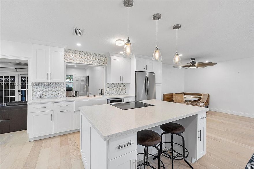 Modern comfort pool home with timeless design. Beautifully renovated home features brand-new French oak wood flooring, the open layout includes a fully updated kitchen with quartz countertops & island and new appliances. Smart home features include Wi-Fi–enabled ceiling fans, a new thermostat, Ring cameras, and an alarm system. Both bathrooms are tastefully remodeled, and key upgrades include a 2017 roof, new A/C, & a tankless water heater. Outdoors, enjoy a sparkling pool, spa, shower, and 2 spacious patio areas with pergolas—all within a fenced backyard. Additional highlights include recessed lighting. Low annual HOA fee. Conveniently located. Bundled service pricing available for buyers. Connect with the listing agent for details. Ask about the assumable VA loan with 3.5% interest rate.