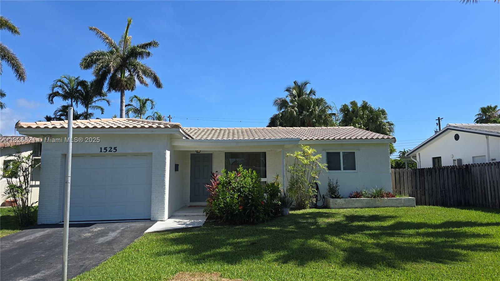 Amazing and bright 2bed 2bath home with a one car garage. Terrazzo floor in the house. Kitchen and bathroom updated. Open layout with a laundry room. Front has a porch and in back you have a nice patio area. House is east of US1 with an alley in back. Hurricane windows and doors. Close to beach and parks.