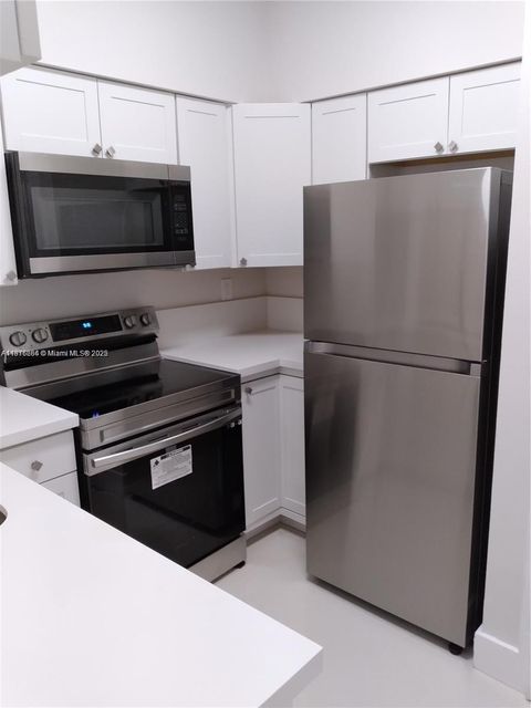 Photo of 1851 NW 96th Ter #6B, Pembroke Pines, FL 33024 (MLS # A11876664)