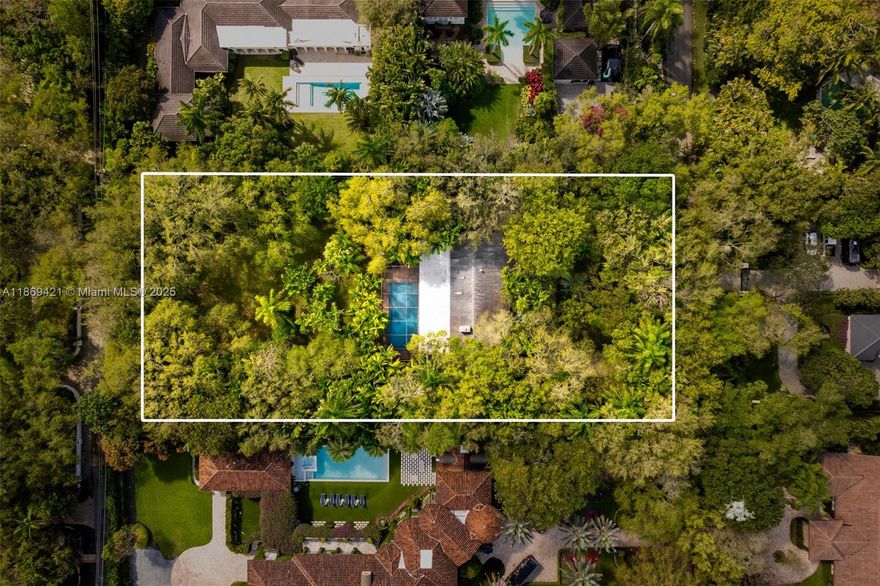Development opportunity in the heart of Ponce Davis. Set on nearly one acre along the coveted Pine Drive, this prime parcel offers the perfect canvas to build a custom estate surrounded by mature oak trees and lush tropical foliage. The existing one-story home can be lived in or leased while plans are drawn, but the true value lies in the land and location. With its unparalleled privacy, prestigious surroundings, and proximity to top private schools, this is a premier opportunity to bring your dream home to life in one of Miami’s most exclusive residential enclaves.