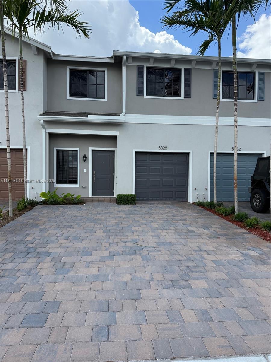 Photo of 5028 Elderberry St #5028, Haverhill, FL 33415 (MLS # A11890363)
