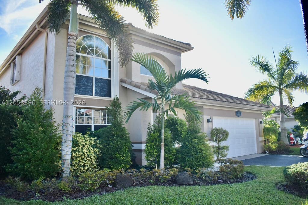 Photo of 1352 NW 129th Way, Sunrise, FL 33323 (MLS # A12058390)