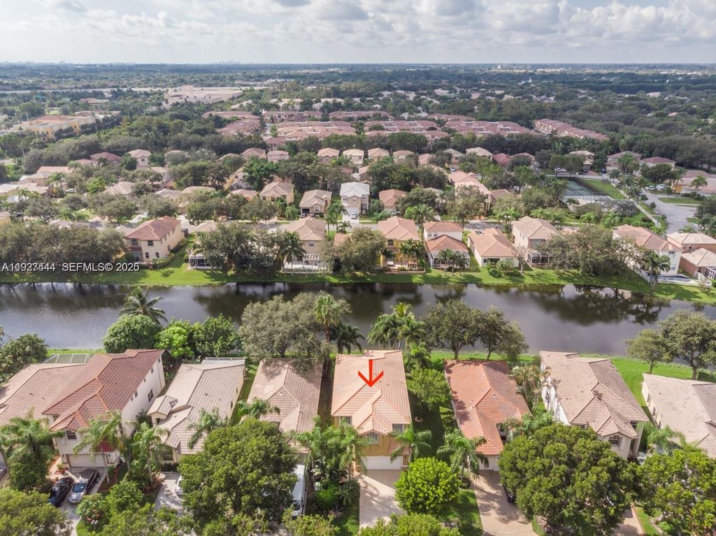 Photo of 4950 Pelican Mnr, Coconut Creek, FL 33073 (MLS # A11927444)