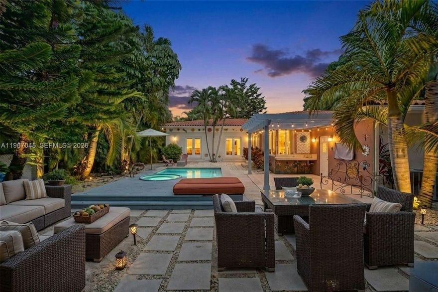 Fully reimagined Coral Gables gem on a rare double lot and prime corner location. 4BR/2.5BA Mediterranean beauty with impact windows and doors, hardwood floors, and soaring ceilings. (HUGE DOUBLE CORNER LOT!) Over 200K Price Reduction & Over $100K in upgrades! Expansive living and dining areas flow into a European kitchen featuring flat-panel cabinetry, quartz counters, wine cooler, and Dacor & Bosch appliances. Marble spa suite offers a frameless glass shower, soaking tub, & double vanity. Enjoy the oversized lanai with wet bar and pass-through to a tropical yard with pergola, deck, lush landscaping, pencil palms, sprinkler system with room for a large pool. 1-car garage & ample parking. Minutes to Miracle Mile. Seller financing available with 50% down. Additional upgrades and features: Barrel tile roof updated 2019 with permits, copper plumbing, upgraded electrical panel (2010), dual-zone AC units (2010) serviced 2024, washer & dryer 2023/2024, Key West–style dipping pool/spa with equipment replaced 2023, full tenting completed March/April 2025 with active termite bait system, fully fenced privacy landscaping, oversized courtyard, garage storage loft, and stepping-stone driveway for multiple vehicles. Prime location near Biltmore & Granada Golf Courses, Venetian Pool, UM, and top-rated schools. On Zillow, scroll down to "facts & features", click on "show more", then click "View virtual tour" for your Virtual Interactive Lifestyle Concierge! Ready for you to personalize!