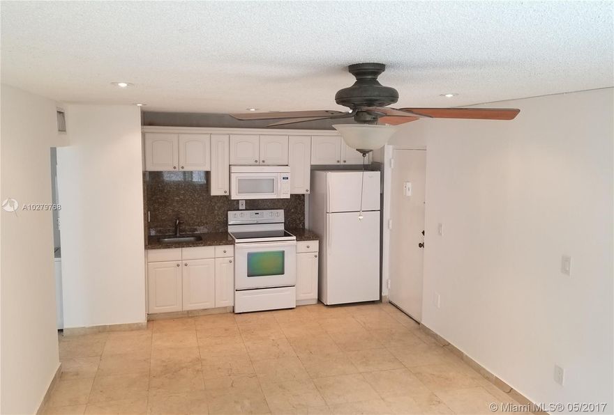 Newly renovated in peaceful, historic end of Michigan Ave, steps from Lincoln Road.  Parking inside a secure, electric gate plus lush gardens surrounding the grounds with an interior sunny pool and lounge area.  Plenty of light and sliding glass doors to a private patio with garden view.  The large size of the apartment means every room is spacious.  Includes 2 full bathrooms of solid marble and tile.  Guest bathroom is complete with a shower and en suite has a shower/tub.  Closets are large enough to use one as an office. Rent includes secure parking and internet.