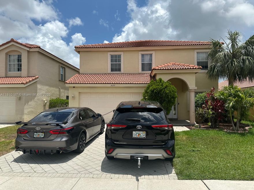 Beautiful lakefront single-family home in the sought-after Grand Isles community! This 4-bedroom, 2.5-bath home offers over 2,100 sq ft of living space with serene water views. Features include a spacious kitchen, open living areas, and a two-car garage. Enjoy a peaceful backyard with lake frontage, perfect for relaxing or entertaining. Grand Isles is a gated community with resort-style amenities: pool, tennis courts, fitness center, and clubhouse. Zoned for top-rated Wellington schools!