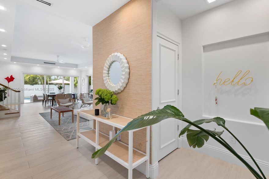 Discover a rare opportunity to lease a stunning 5-bed, 6.5-bath home in the prestigious gated community of Grand Bay Villas & Estates of Key Biscayne. This 3,900 sq ft residence offers refined island living with privacy and 24/7 security, steps from beaches, parks, and top schools. Soaring ceilings and natural light enhance the open layout, featuring a gourmet kitchen, spacious family/media rooms, and a 2-car garage. Enjoy a luxe primary suite with dual baths, en-suite bedrooms, private office, and a covered terrace with BBQ, heated pool, and lush landscaping. Direct access to the community park makes it feel like an extension of your backyard. Just 15 mins to Brickell and close to Miami International Airport. Annual lease, furnished or unfurnished (art excluded).