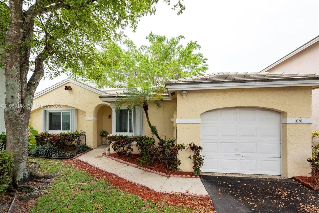 Photo of 828 NW 99th Ave, Plantation, FL 33324 (MLS # A11983148)