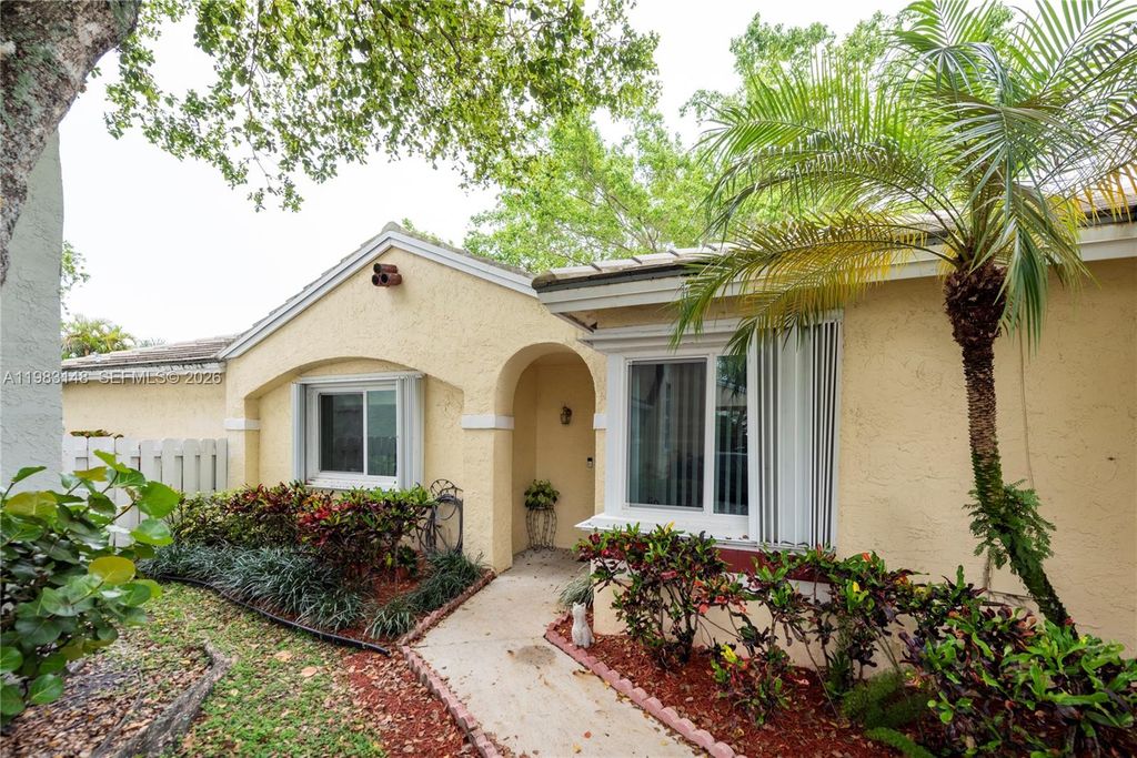 Photo of 828 NW 99th Ave, Plantation, FL 33324 (MLS # A11983148)