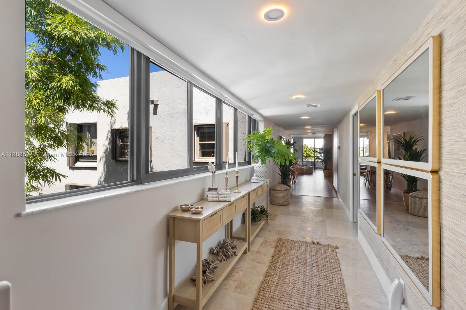 SPECTACULAR FULLY REMODELED 4 BED / 2 BATH PENTHOUSE IN BOTANICA AT KEY COLONY, A BEACHFRONT GATED COMMUNITY IN KEY BISCAYNE. ONE OF THE FEW 4-BEDROOM UNITS W 2,000 SF OF LIVING SPACE. THIS RARE CORNER UNIT FEATURES AN OPEN FLOOR PLAN W RENOVATED KITCHEN, NEW PORCELAIN COUNTERTOPS & BACKSPLASH OVERLOOKING LIVING/DINING. WOOD FLOORS, ELEGANT WALL COVERINGS, ELECTRONIC BLACKOUT SHADES, NEW CUSTOM CLOSETS, NEW BRASS FIXTURES. 4TH BEDROOM IDEAL AS OFFICE, DEN, STORAGE, OR SERVICE. DOUBLE DOOR ENTRY, WIDE HALLWAY, ABUNDANT LIGHT, BALCONY W SUNSET VIEWS. ALL FURNITURE BRAND NEW (AUGUST 2025), UNFURNISHED OPTION ALSO AVAILABLE. RESORT-STYLE AMENITIES: BEACH ACCESS, 12 TENNIS COURTS, SPA, POOLS, FITNESS, PLAYGROUND, CONVENIENCE STORE. THIS UNIQUE PENTHOUSE OFFERS THE BEST OF KEY BISCAYNE LIVING.