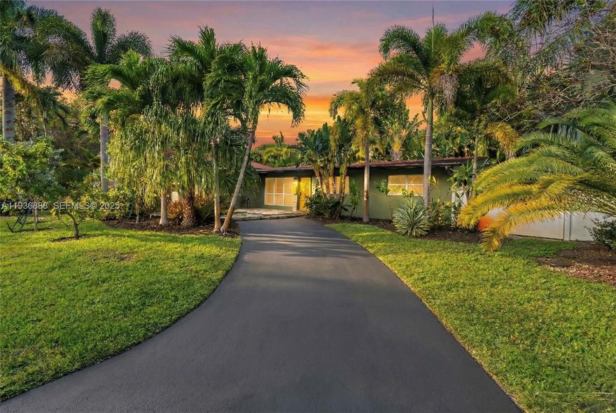 Welcome to a truly unique Wilton Manors residence where lifestyle, flexibility, and low maintenance living come together. Nestled on a quiet street and set on an oversized corner lot of over 11,000 sq ft, this 4 bedroom, 3 bath pool home is surrounded by lush landscaping that creates a rare sense of serene privacy. Large impact windows throughout flood the home with natural light, enhancing the open, airy feel and making the property feel like a true tropical oasis. Whether hosting friends poolside or enjoying quiet mornings surrounded by greenery, the setting offers calm and privacy rarely found in the heart of Wilton Manors. Modern finishes shine in the updated kitchen and baths, including two ensuite bedrooms that provide ideal privacy for large families, guests, or investment use. The expansive primary suite is tucked into its own private wing with a dedicated A C and opens directly to a private patio and heated lagoon style pool. The backyard features new turf with a mini golf setup, delivering resort style enjoyment with minimal maintenance. Additional highlights include two separate driveways, a 2 car garage, new vinyl fencing, upgraded electrical and insulation, and a full house generator for peace of mind. With an easy 5 bedroom conversion option and a prime location near Wilton Manors dining, beaches, I 95, and Fort Lauderdale Airport, this home is ideal as a primary residence or a high demand investment opportunity.