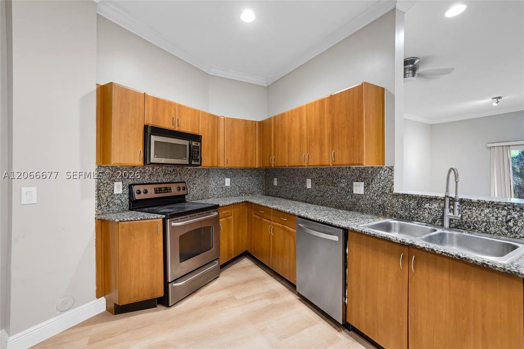 Photo of 2929 SW 18th Terrace, Fort Lauderdale, FL 33315 (MLS # A12066677)