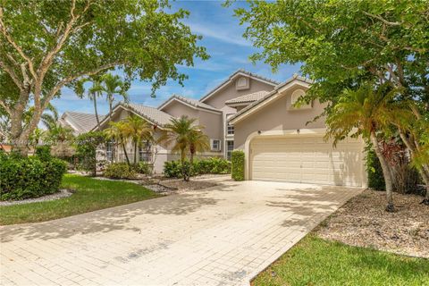 Photo of 1750 NW 127th Way, Coral Springs, FL 33071 (MLS # A11841460)