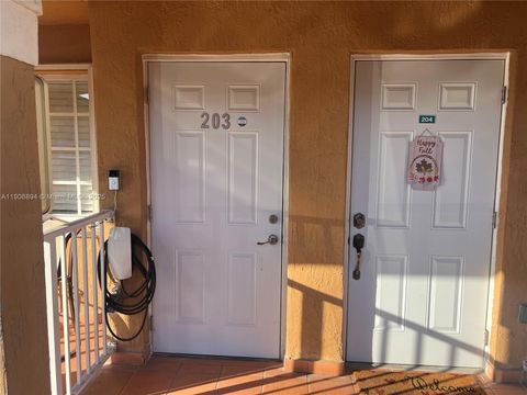 Photo of 7845 W 36th Ave #203, Hialeah, FL 33018 (MLS # A11906894)