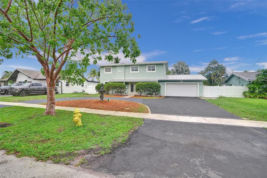 OCEAN ACCESS. Waterfront Living in Plantation Isles! 5-bed, 3.5-bath home situated on nearly 1/3 of an acre, with an oversized 2-car garage, large driveway, and side yard parking—perfect for your boat or RV. Huge and private yard features a saltwater pool and private dock with 30 ft of private dock space...2 fixed bridges. Features include impact windows and doors, metal roof, tile flooring, an open kitchen with ample counter space, formal dining area, and 2 master suites with walk in closets. Located in a quiet, established neighborhood and close to everything—this is true South Florida living. You're close to golf courses, top-rated dining, and major retail. With the international airport just 15 minutes away and highways within easy reach.