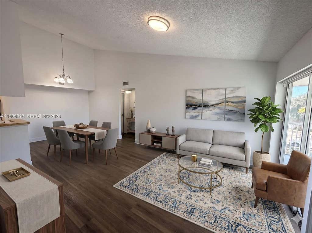 Photo of 5720 Rock Island Rd #400, Tamarac, FL 33319 (MLS # A11989518)