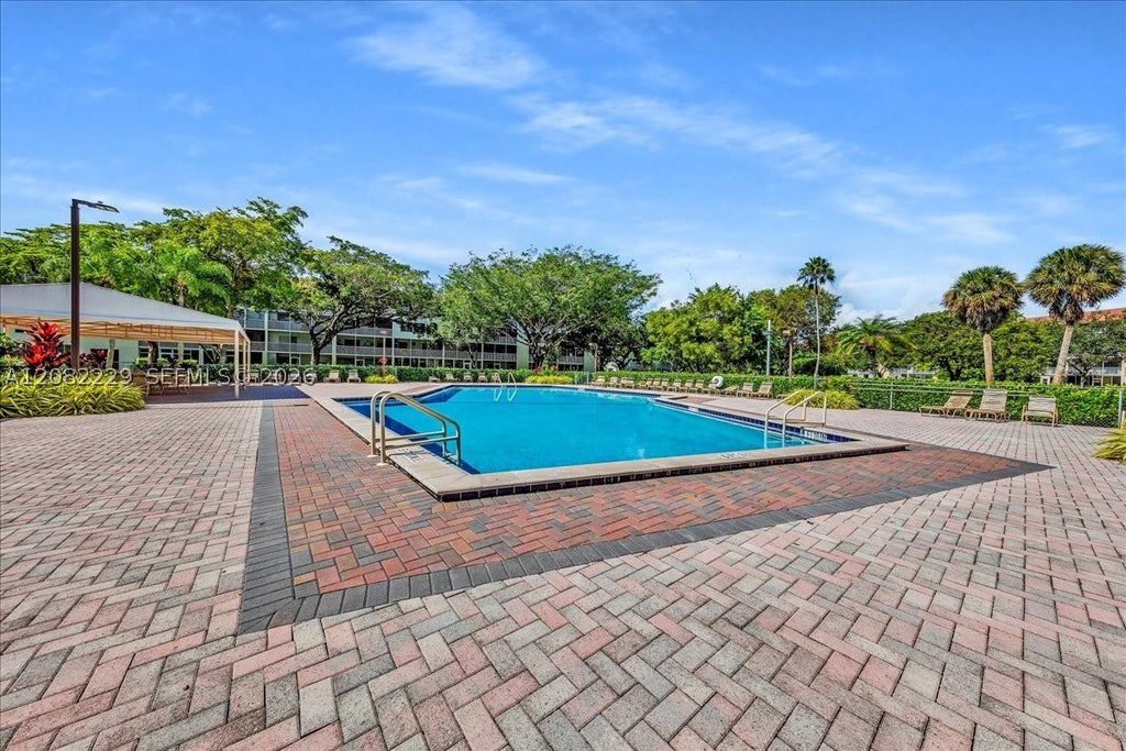 Photo of 13250 SW 7th Ct #210L, Pembroke Pines, FL 33027 (MLS # A12082229)
